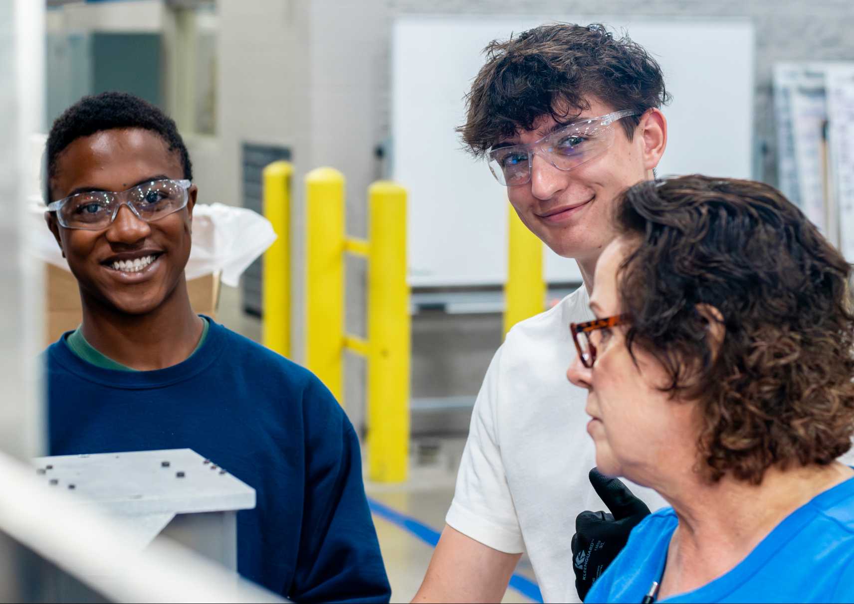 three employees on shop floor